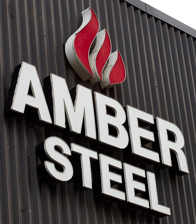 Amber Steel logo on the side of a building